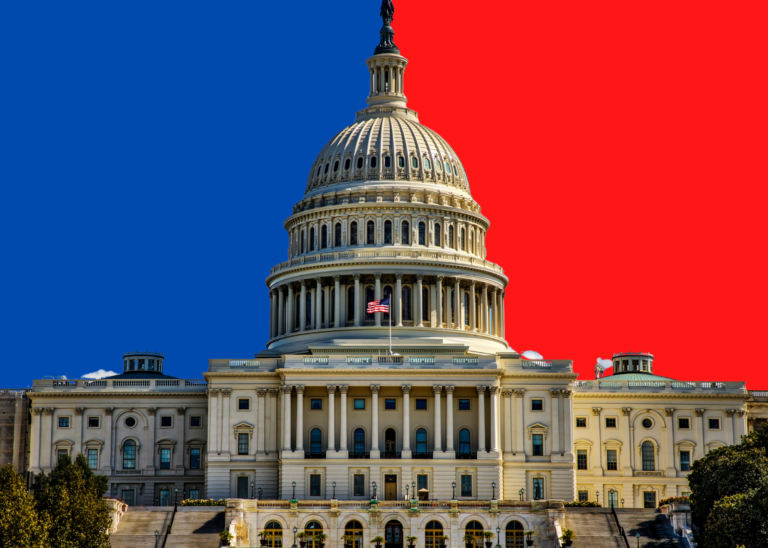 US Capitol building with a blue and red backdrop